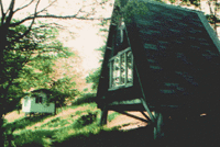 original farmhouse and first cottage constructed by Kirtanananda and Hayagriva